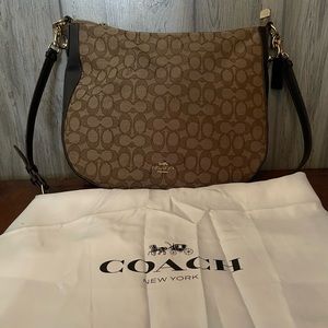 Coach Saddle Bag 11” across bottom and 10” high